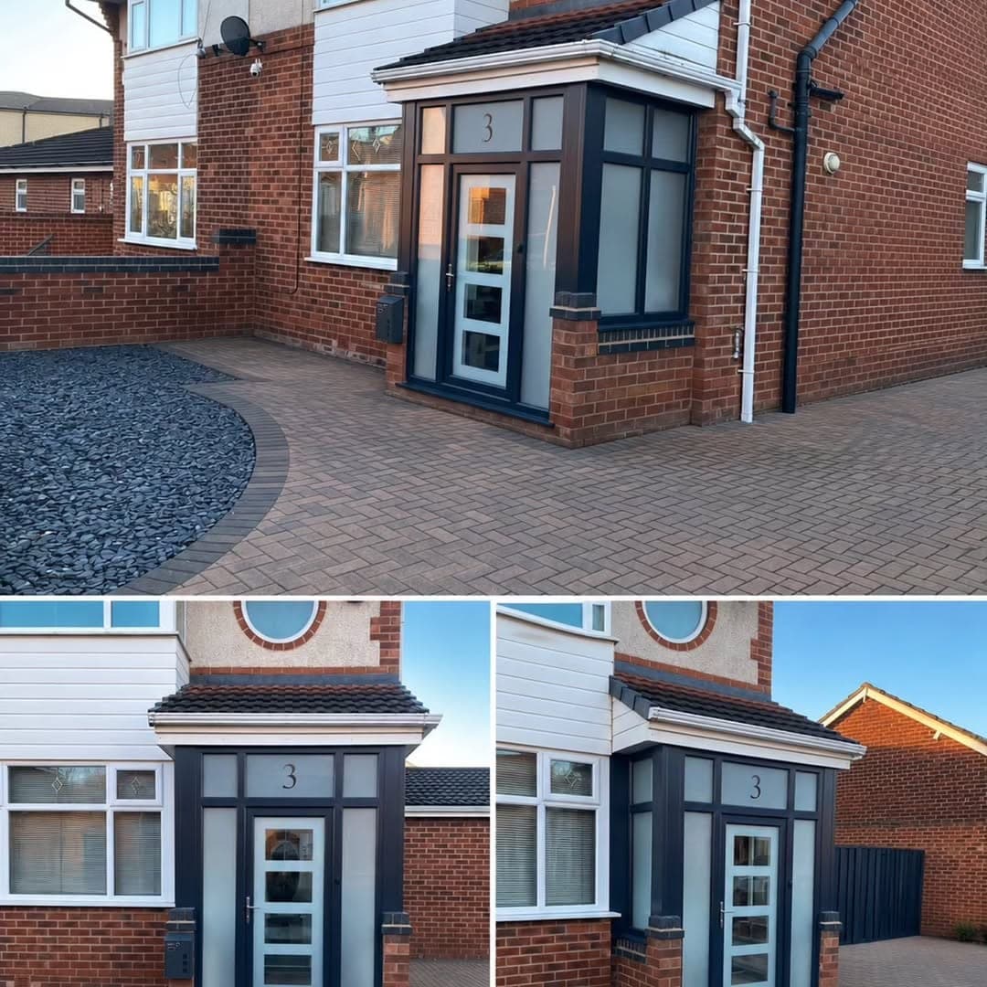A newly built brick porch enclosure on a red brick house, with anthracite grey frames, a composite front door and block paving up to it